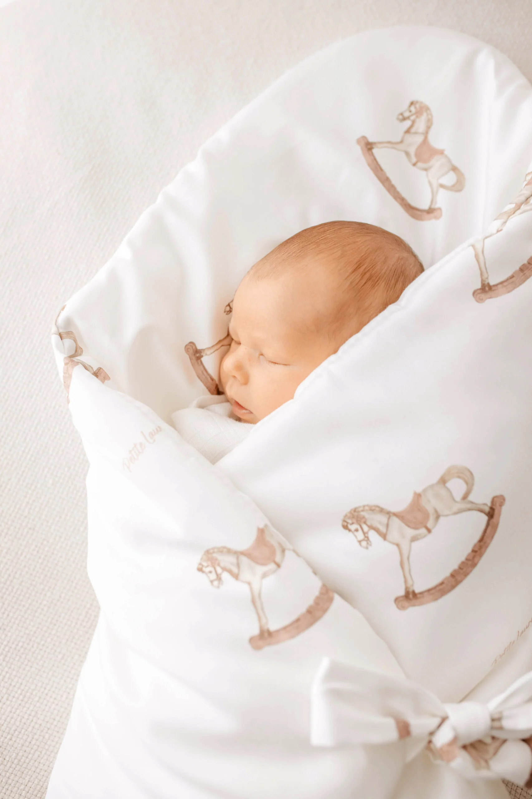 Petite Laure Rocking Horse Baby Wrap With Bow  - Pink